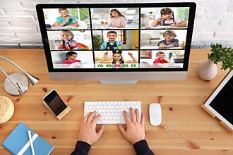 Distance education during quarantine and lockdown due to Covid-19 pandemic. Teacher giving online school lesson