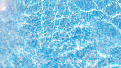 Shining water in the swimming pool. 4k video