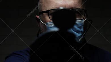 Slow Motion with Doctor Wearing Face Mask Against COVID-19 Using Stethoscope