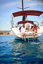 Woman on yacht having fun at summer party on the yacht deck