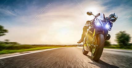 Motorbike on the road riding. having fun riding the empty road on a motorcycle tour / journey