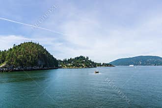 HOWE SOUND, CANADA - JUNE 2, 2019: landscape view of the Bay going to Bowen island summer morning