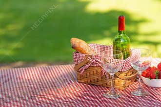 Picnic. bottle of wine with glasses. strawberry.romance.banner