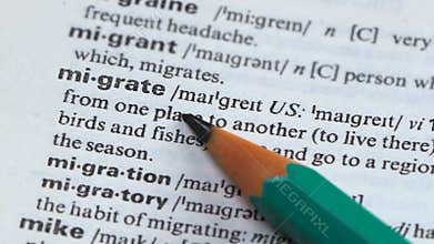 Migrate, definition written in vocabulary, moving to another place, asylum labor