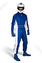 Determined race driver in blue white motorsport overall shoes gloves and integral safety crash helmet isolated white background.