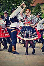 Brno - Bystrc, Czech Republic, June 22, 2019. Traditional Czech feast. Folk Festival. Girls and boys dancing in beautiful costumes
