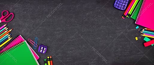 School supplies double corner border banner, top view on a chalkboard background with copy space. Back to school.