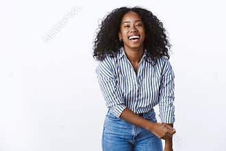 Wellbeing happiness people concept. Entertained charming friendly carefree african american woman curly-haired bending
