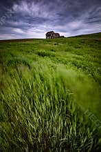 Rural landscape with old house