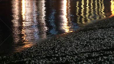 Neon lights reflected on sea water
