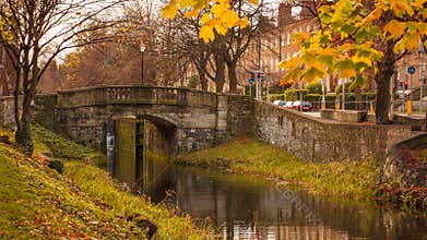 Autumn / Fall scene in Dublin, Ireland. Beautiful autumnal colors and old stone bridge