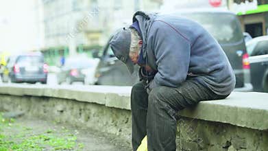 Beggar homeless man tramp. Poverty. Vagrancy. Kyiv. Ukraine.
