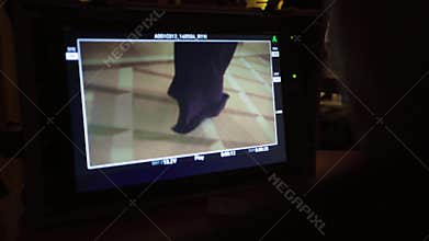 Film director monitor during filming. Filmmaking. Film production.