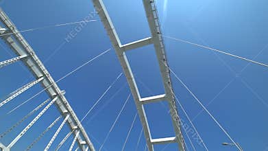 Cars go on Crimean bridge. Shooting wide angle lens
