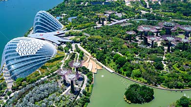 Gardens by the Bay, Singapore, Asia. Aerial view of Flower Dome, Cloud Forest and Park with Supertrees.