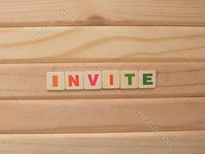Word Invite on wood