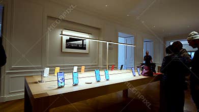 Customers admiring the nbew iPhone 11 Pro smartphones