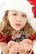 Child Blowing Snowflakes