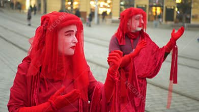 BRNO, CZECH REPUBLIC, JANUARY 10, 2019: Extinction rebellion red brigade pantomime, panto mime activists and activism