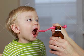 Ill child with cough syrup