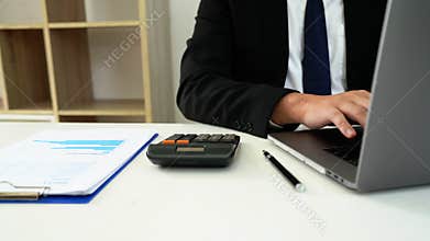 4k video of business man hand using calculator calculating financial expense cost at home office, finance accounting concept