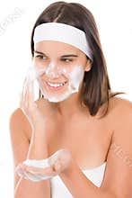 Teenager problem skin care - woman wash face