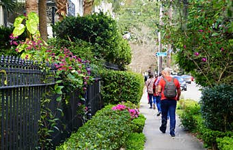 New Orleans, Louisiana, U.S.A - February 8, 2020 - Tourists on the walking tour near The Garden District