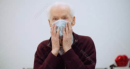 Old man wearing mask against coronavirus