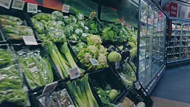 Bonn, Germany - 14 of Dec., 2019: interior shot of REWE supermarket in Bonn POV view. Healthy eating vegetables on the