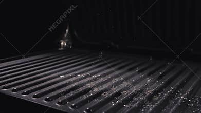 Delicious juicy meat steak cooking on grill. Aged prime rare roast grilling marble beef. Electric roaster, rosemary