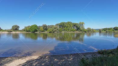 View of the Danube, a river that flows through Bavaria with fields and meadows on the banks