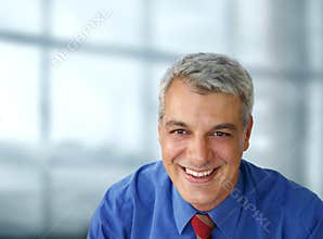 Casual businessman smiling