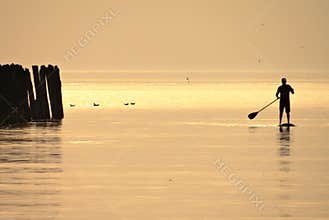 Man paddling on a board