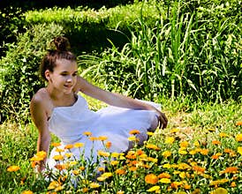 Ballerina in flower garden
