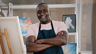Portrait close up male happy old 50s painter art teacher African American happy elder senior middle-aged man artist