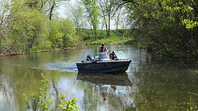 NISSWA, MN - 27 JUL 2022: Law Enforcement Officers patrol in a motor boat.
