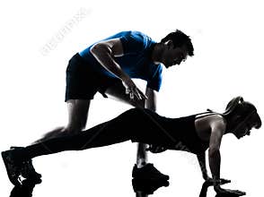 Aerobics intstructor with mature woman exercising