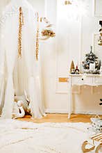 Stylish christmas living room interior with curved furniture,