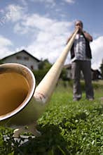 Playing the alphorn