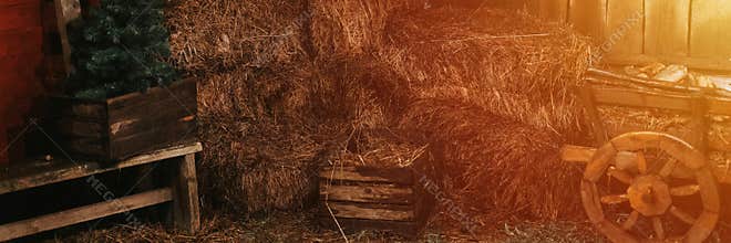 sheaves of hay in a wooden barn. harvesting food dry straw for feeding livestock. rustic country retro scene