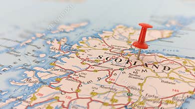 A red pin in a map of Scotland