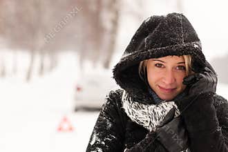 Woman car breakdown snow accident winter road