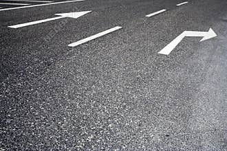 Traffic signs painted in road