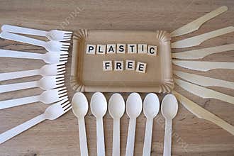 Plastic free picnic wooden cutlery, paper plates and copper drinking straws