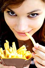 Girl eating fries