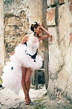 Bride in wedding gown decorated by artificial dragonflies