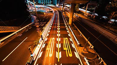 Long Exposure Timelapse of fast moving car traffic transportation on road, highway, bridge in Tokyo Japan