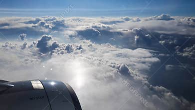 Breathtaking view from plane's illuminator during morning flight. 4K video
