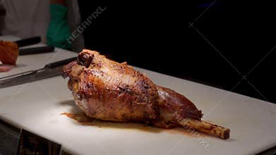 Grilled Leg of Lamb on cutting pad at Japanese restaurant