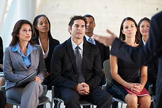 Audience Listening To Presentation At Conference